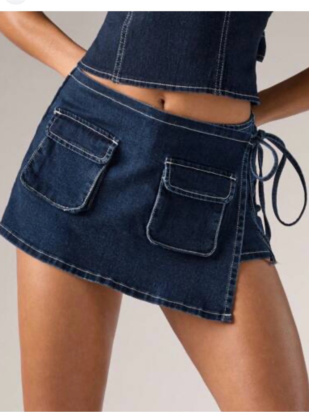 Lioness Dark Blue Denim Mini Skirt with Front Pockets